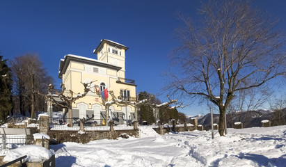 View of the facade sunlight with flags