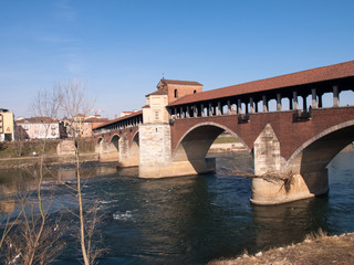 Naklejka premium Pavia, covered bridge over the river Ticino