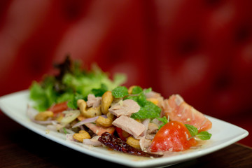 Thai spicy tuna salad with onion and tomato