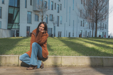 Beautiful girl posing in an urban context