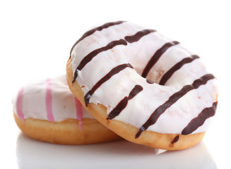 Delicious donuts with icing isolated on white