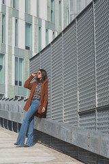 Beautiful girl posing in an urban context