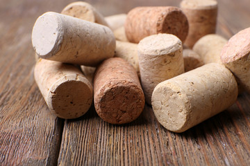 Wine corks on wooden background