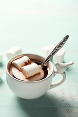 Hot chocolate with marshmallows in mug,