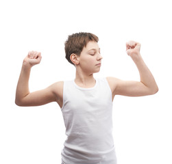 Happy young boy in a sleeveless shirt