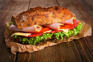 Fresh and tasty sandwich with ham and vegetables © Africa Studio