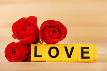 Fototapeta premium Decorative letters forming word LOVE with flowers