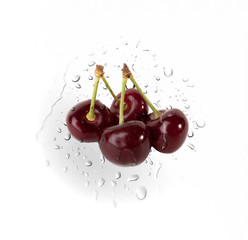 Fototapeta na wymiar Cherries on Water drops background