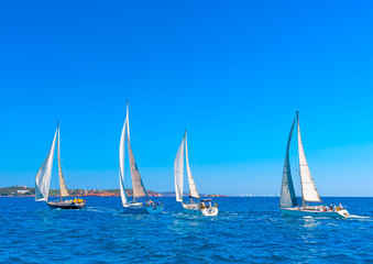 Fototapeta na wymiar sailing boats during a regatta in Saronikos gulf in Greece