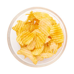 Multiple potato chips in a glass bowl