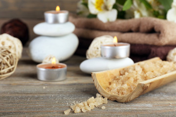 Beautiful spa composition with sea salt on wooden background