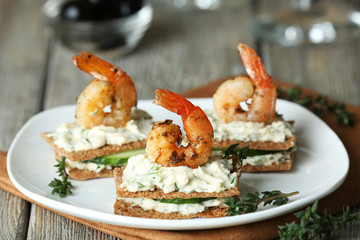 Appetizer canape with shrimp and cucumber