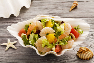 Shrimp salad with grapefruit, orange and roasted peanuts. - Serv © gkrphoto