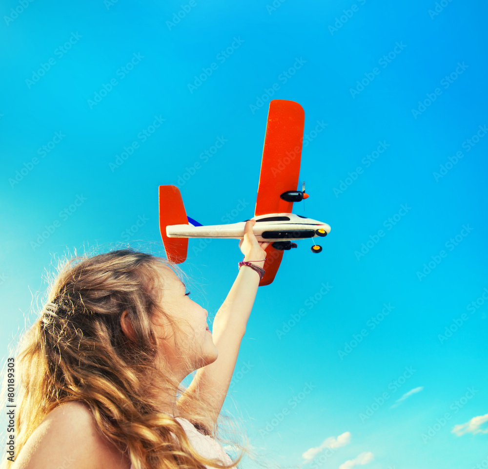 Poster Girl playing with plane