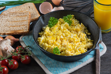 eating healthy breakfast,scrambled egg with wholegrain toast and
