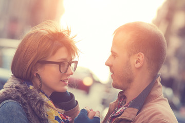 Urban couple outdoors.