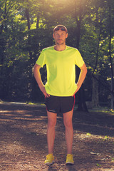 Fototapeta na wymiar Jogger ready for some exercise in a park/forest.