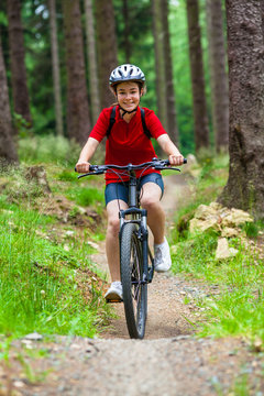 Healthy lifestyle - teenage girl biking