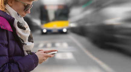 Crossing the street while typing messages. Danger! © astrosystem