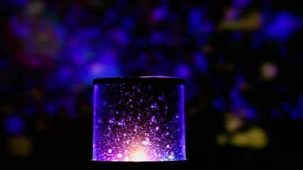 Lot of particles in glass tube, light color changes - Powered by Adobe