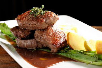 Venison meat steak with potato puree and vegetable