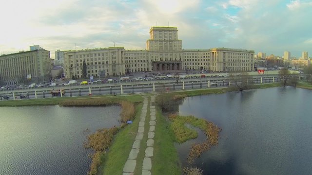 ponds in park Lefortovsky near quay with traffic 
