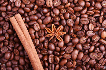 Brown coffee, cinnamon and star anise on the table