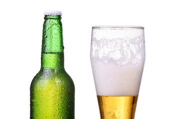 Isolated bottle and glass with light beer