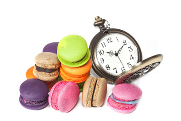 France dessert  macaroons and clock on white background ,isolate