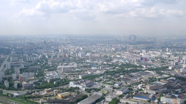 White clouds float over residential area of Moscow, time lapse