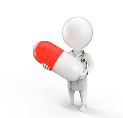 Doctor stands with pill in his hands