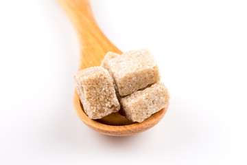 brown sugar in a wooden spoon