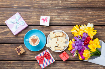 Cup of cappuccino with heart shape and cookies