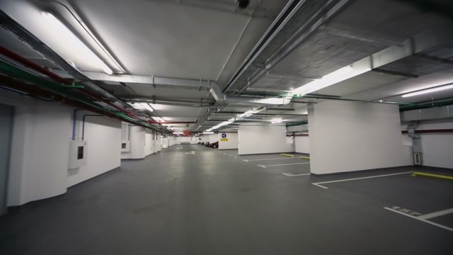 Underground parking with few cars and many free places