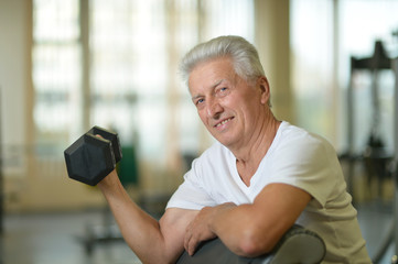 Elderly man in a gym