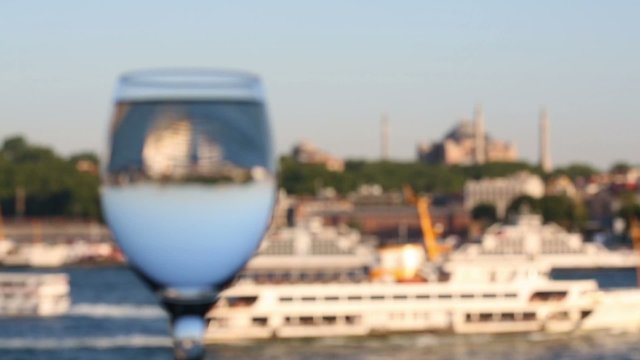 Wineglass and ship and mosque in Istanbul, Turkey