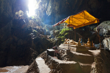 Reclining Buddha statue in Tham Phu Kham cave, Vang Vieng, Laos