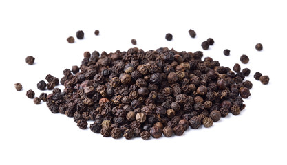 Black peppercorns isolated on white background.