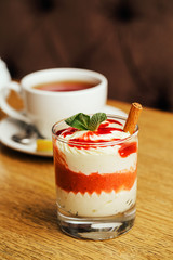 tea with white mousse with milk cream