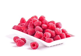 Fresh red raspberry isolated on white background