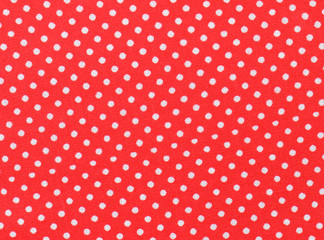 Red and white polka dot fabric © kuarmungadd