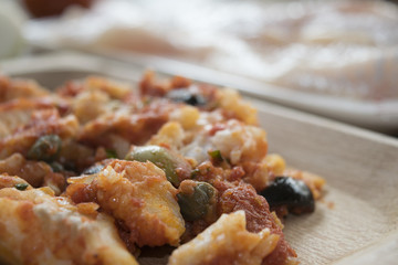 cod with olives capers and tomato sauce