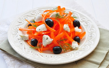 Carrot pasta salad with feta, olivs and dill