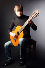 Acoustic guitar player classical guitarist