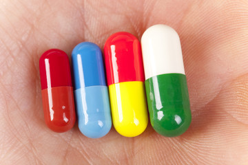 Capsule pills lies on the hand