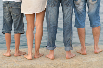 Fototapeta na wymiar Family feet on beach