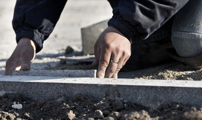 Paver's hand working