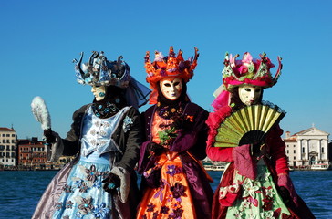 Fototapeta premium Group of people in costumes and masks, Venice carnival