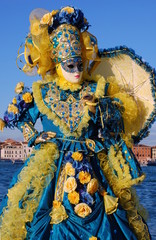 Carnival of Venice, Italy. Woman in costume and mask