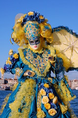 Carnival of Venice, Italy. Woman in costume and mask